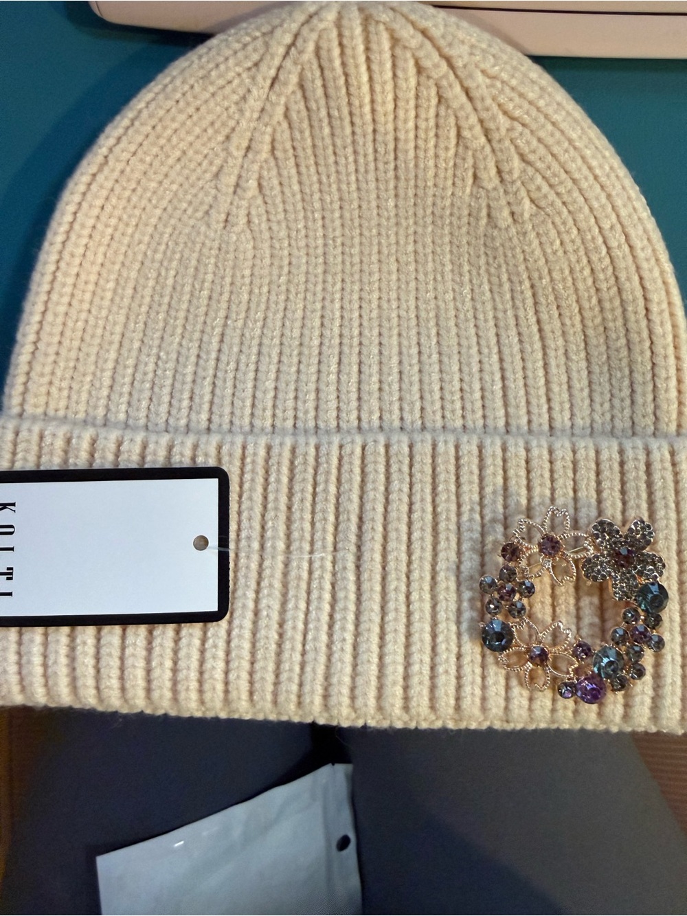 Cream Ribbed Knit Beanie with Decorative Crystal Brooch